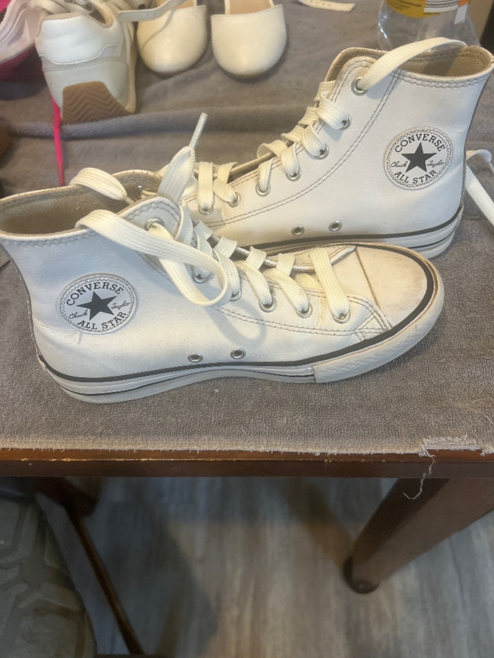 Chuck Taylor leather high tops